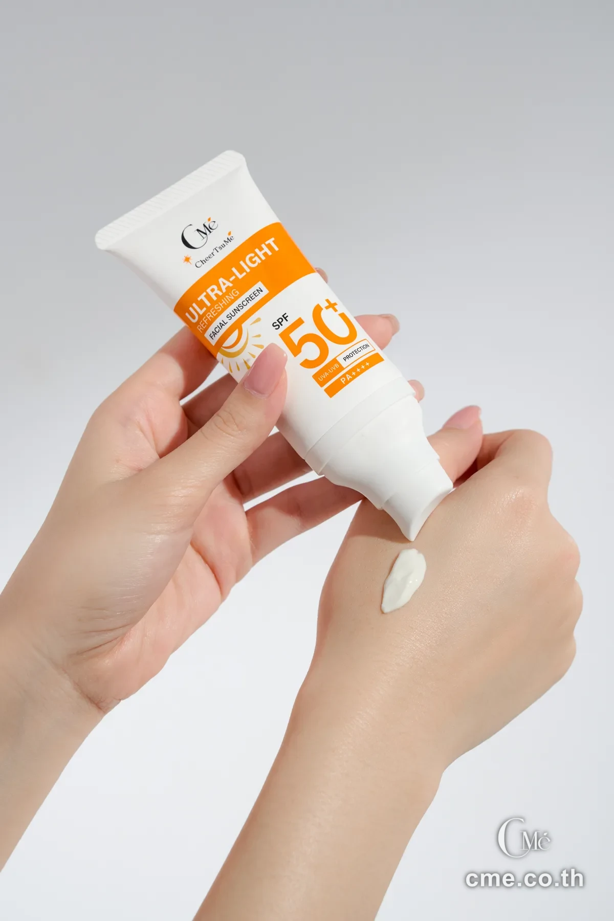 CMe Sunscreen SPF50+ — studio shot of bottle and premium packaging