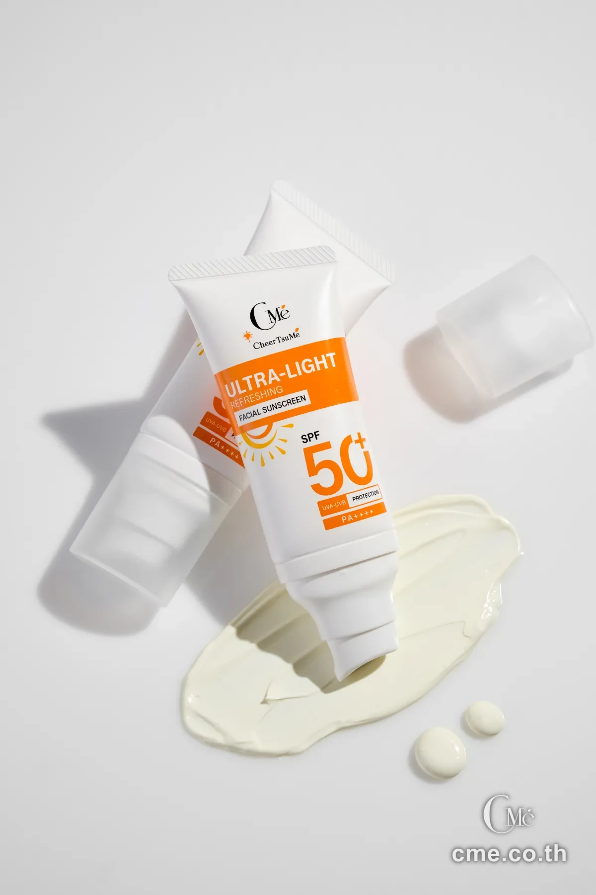 CMe Sunscreen SPF50+ — studio side angle showing cap and product details